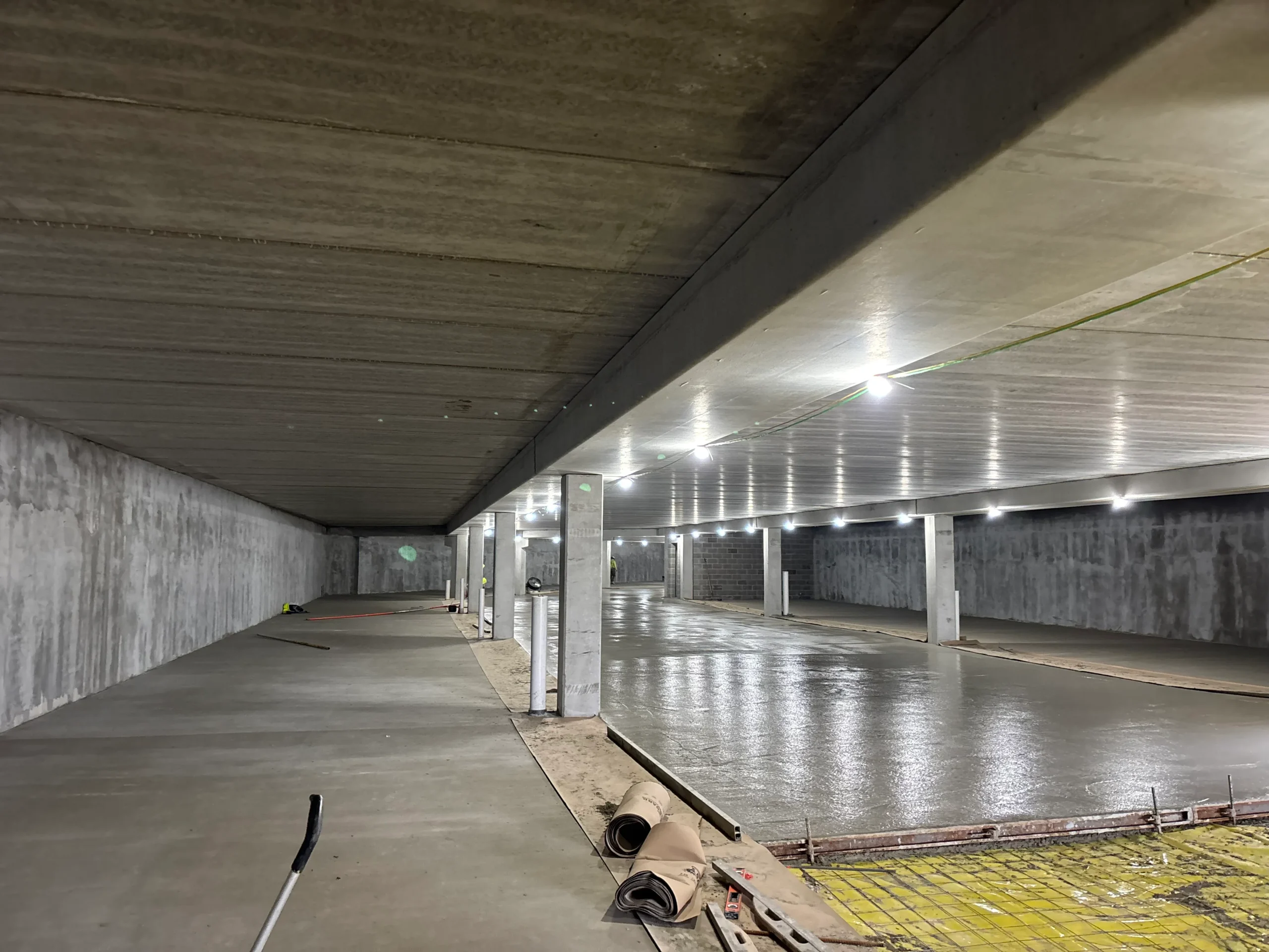 An active construction site with materials and structures in progress.