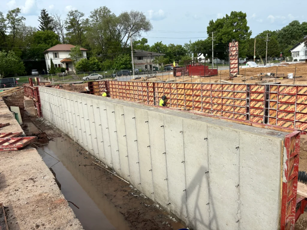 An active construction site with materials and structures in progress.