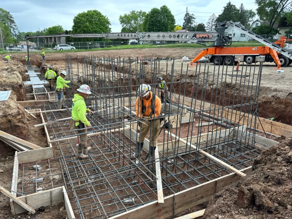An active construction site with materials and structures in progress.