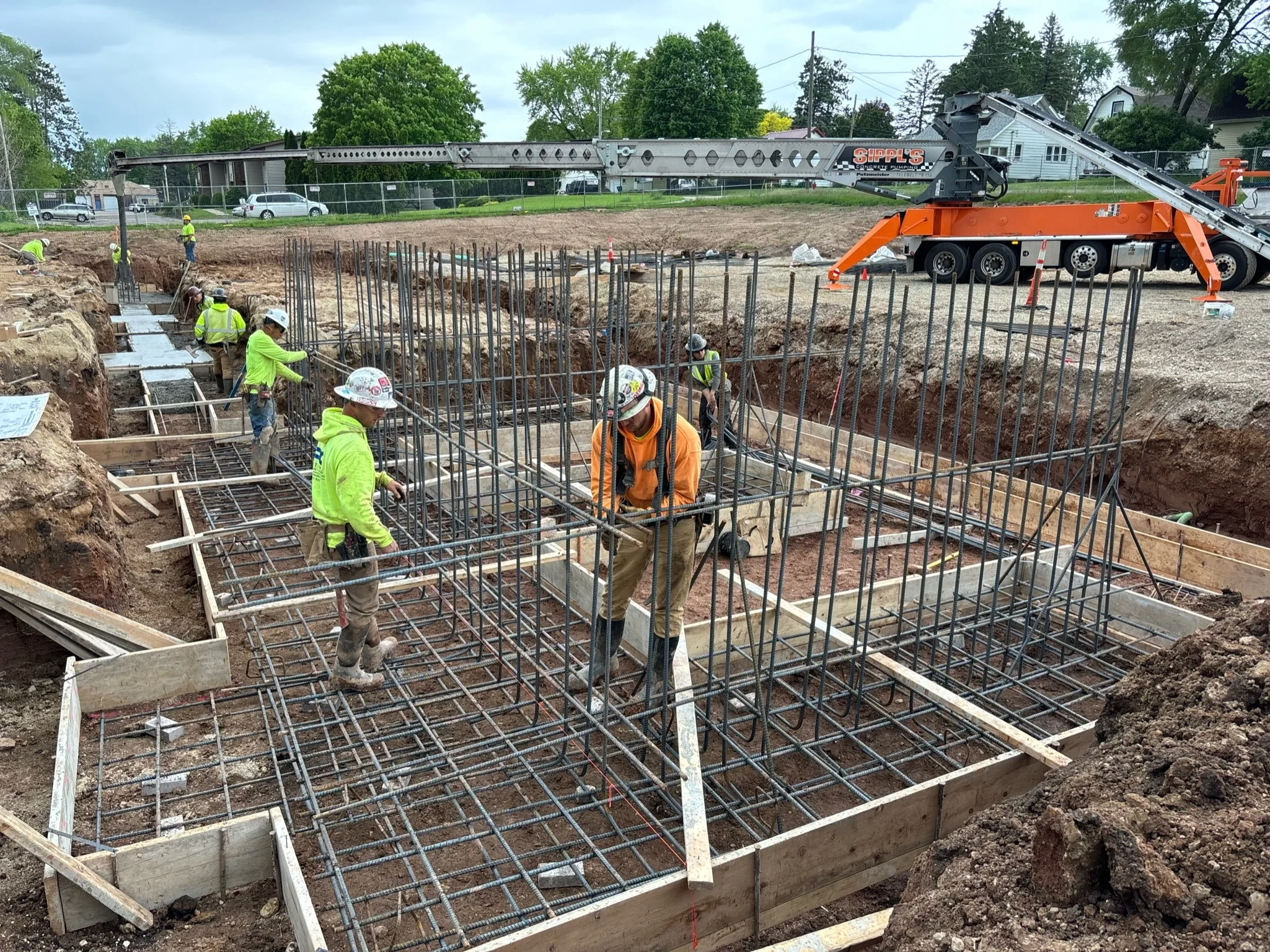 An active construction site with materials and structures in progress.
