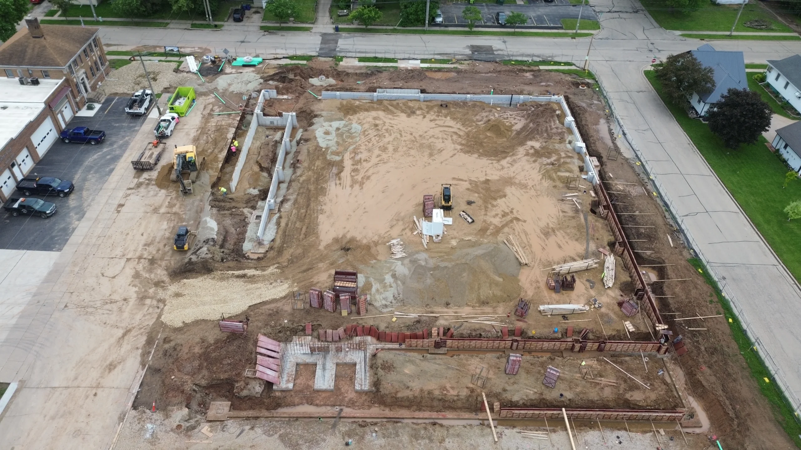 An active construction site with materials and structures in progress.