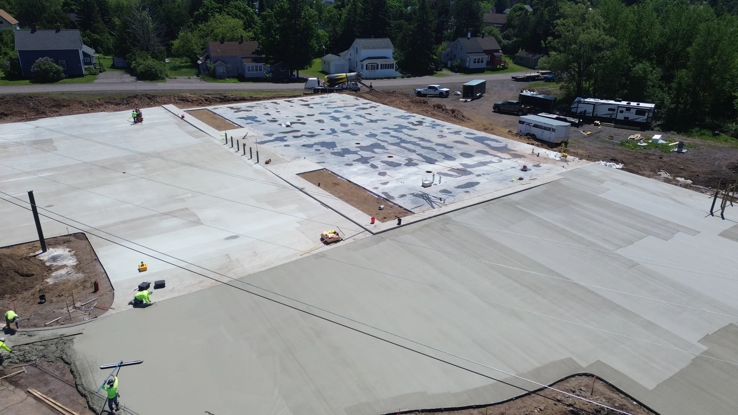 An active construction site with materials and structures in progress.