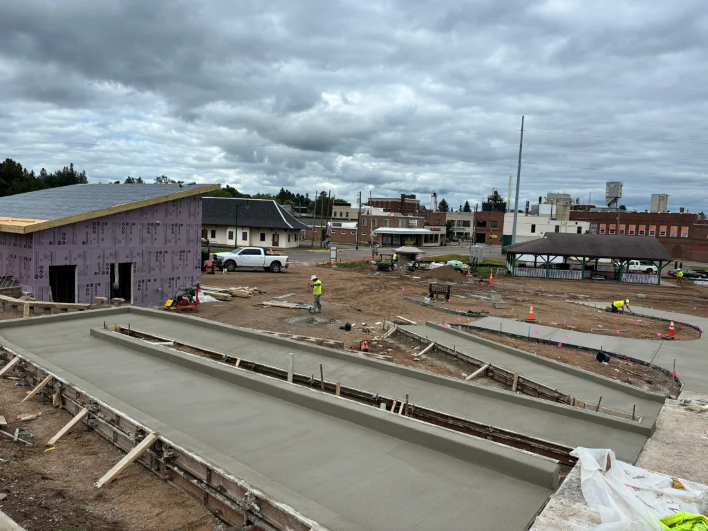 An active construction site with materials and structures in progress.