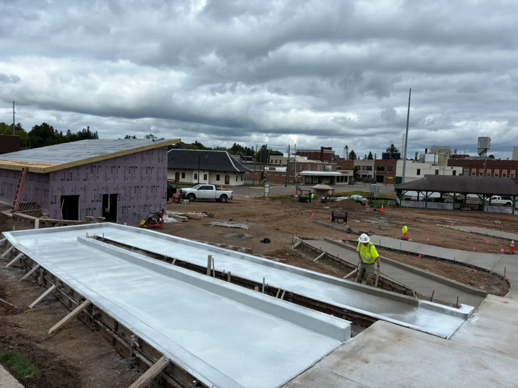 An active construction site with materials and structures in progress.
