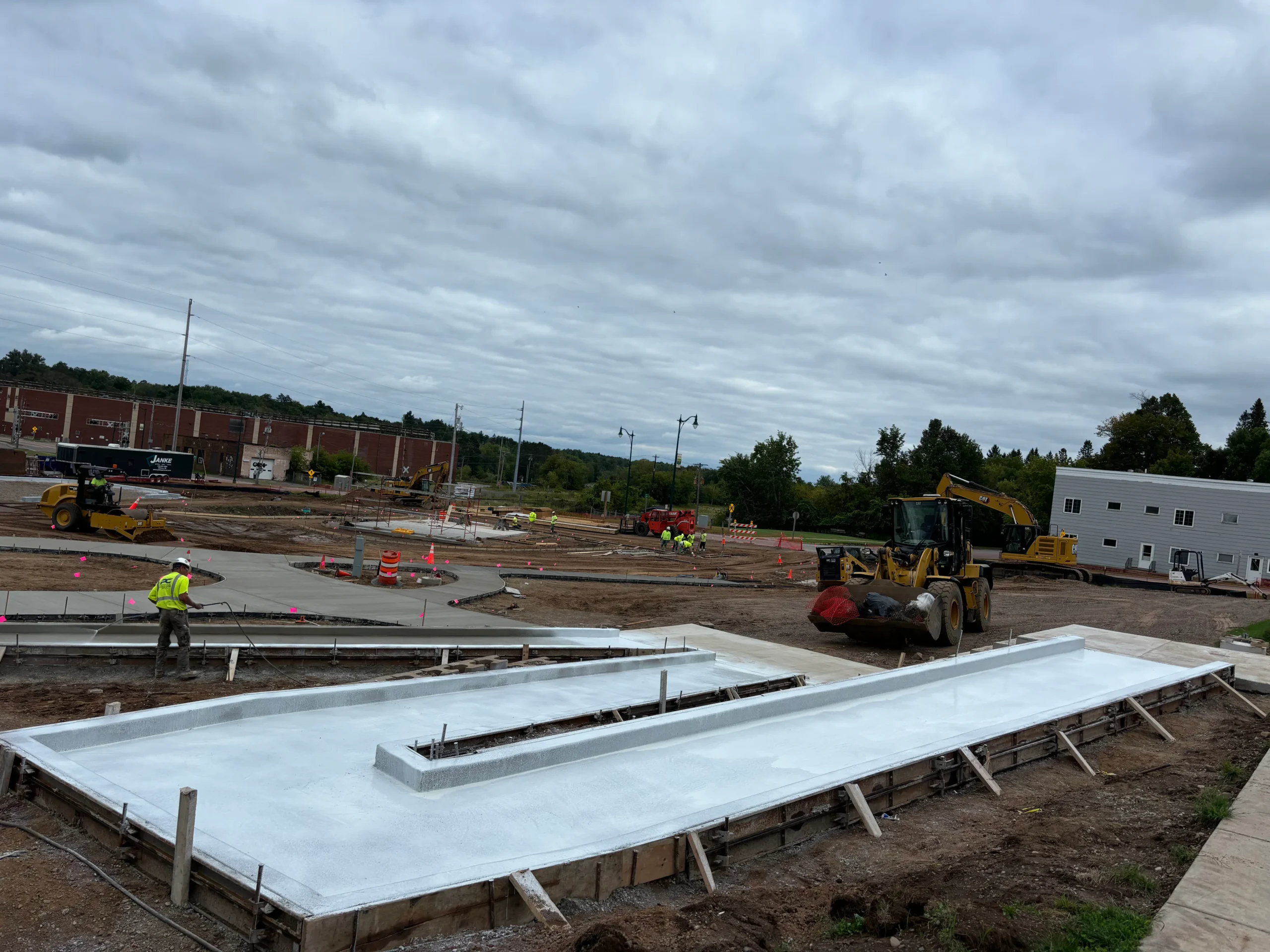 An active construction site with materials and structures in progress.
