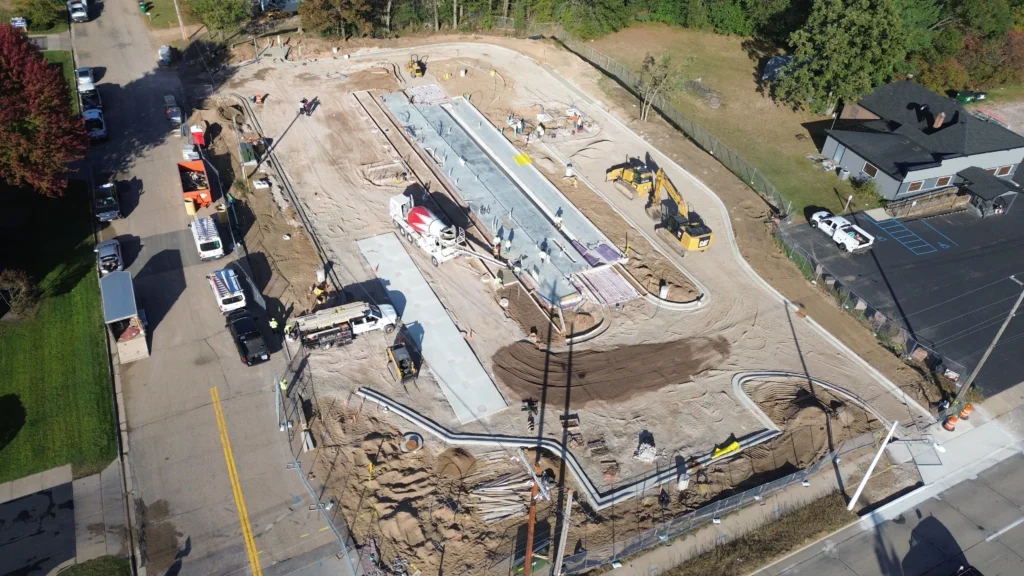 An active construction site with materials and structures in progress.