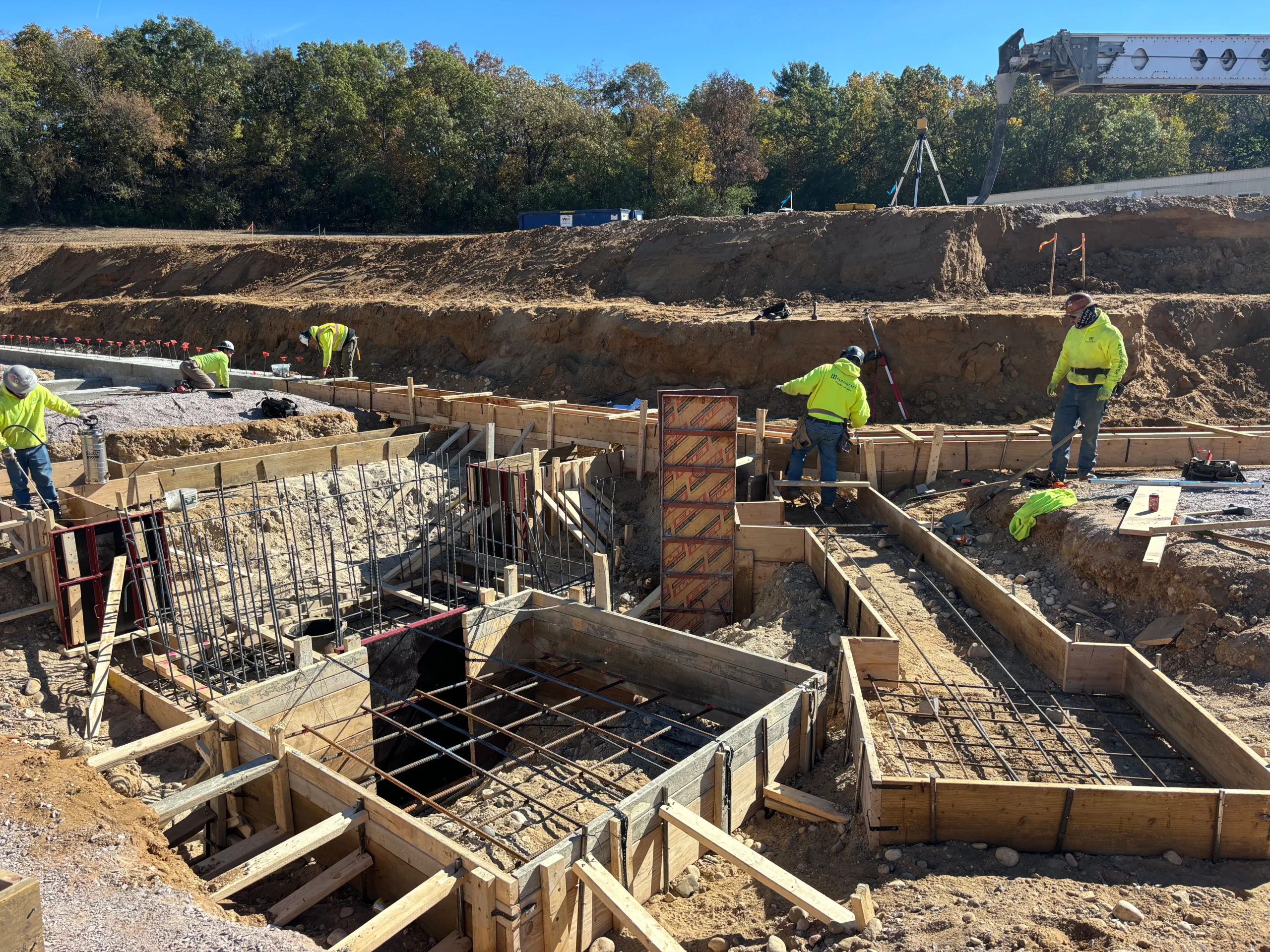 An active construction site with materials and structures in progress.