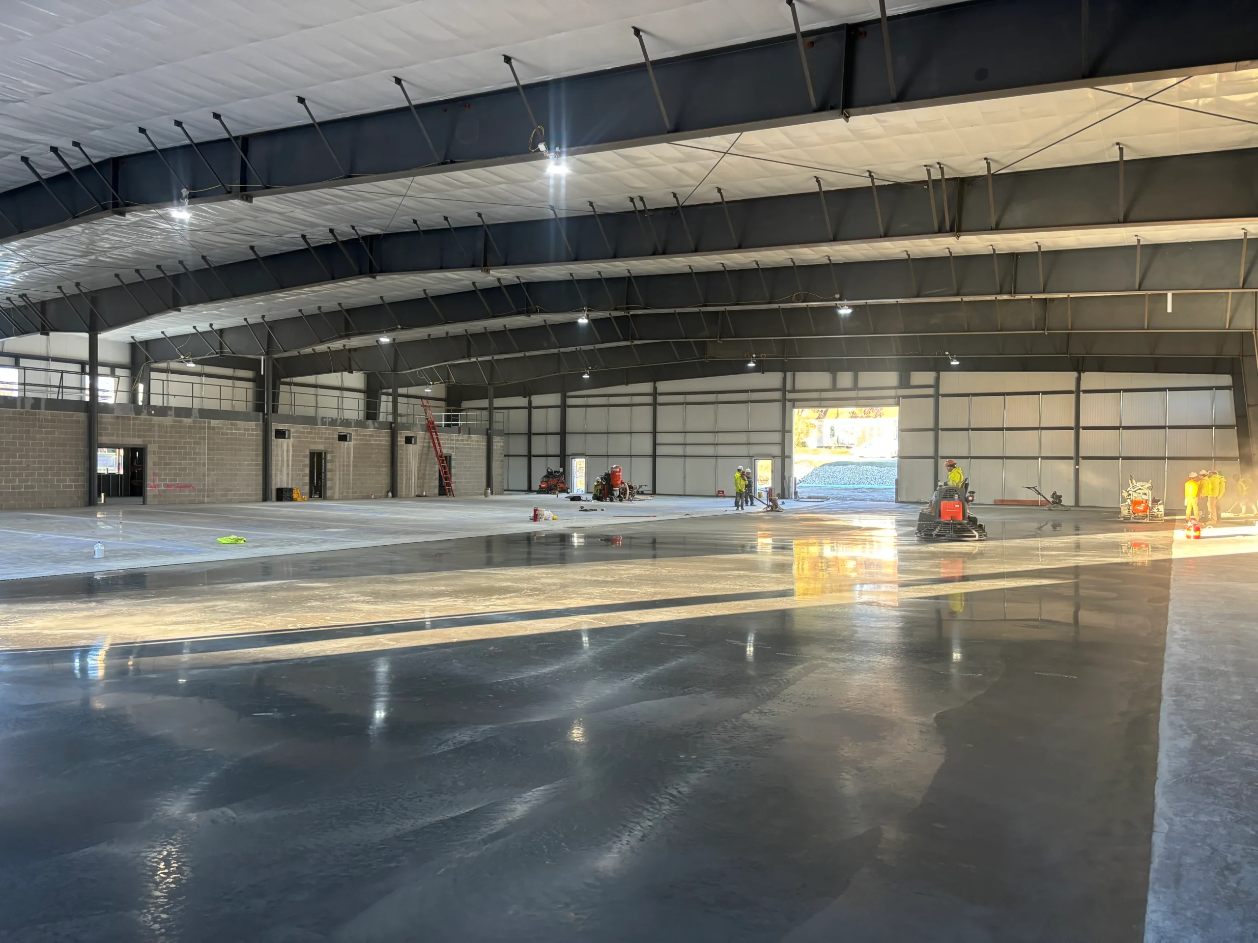 An active construction site with materials and structures in progress.