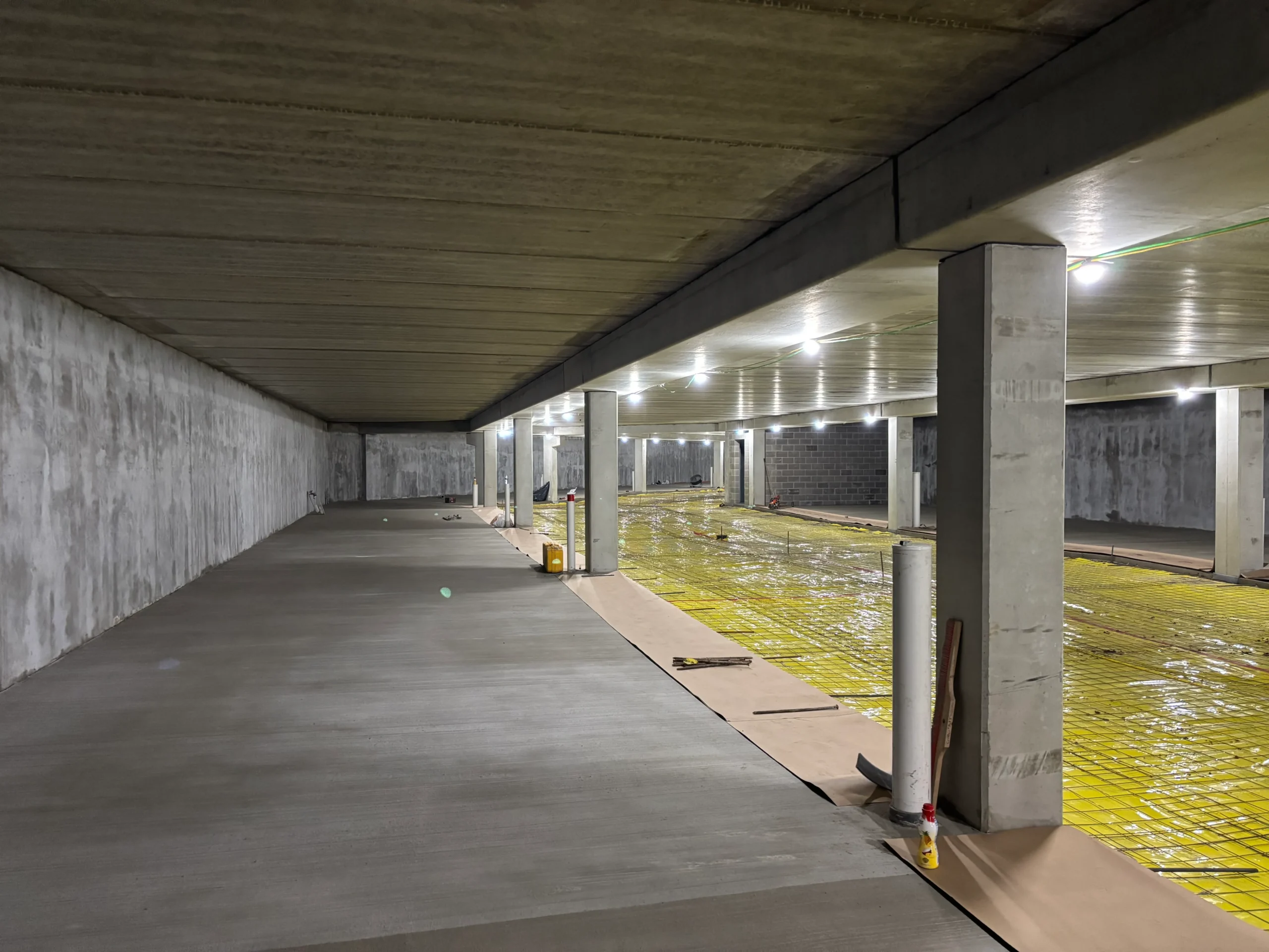 An active construction site with materials and structures in progress.