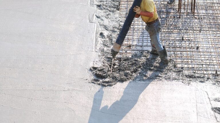 Concrete pouring during commercial concreting floors of buildings in construction