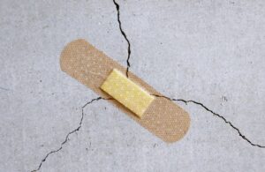 Band-Aid on a Crack in Concrete